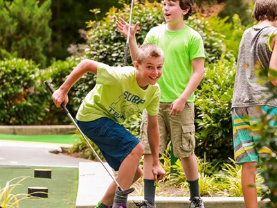 Kids playing Mini-Golf