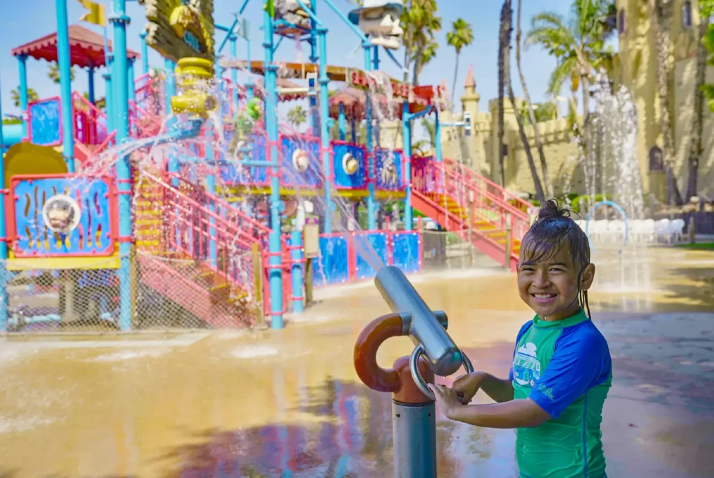 boy with water cannon at buccaneer cove