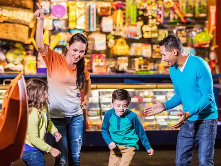 Family playing in the arcade