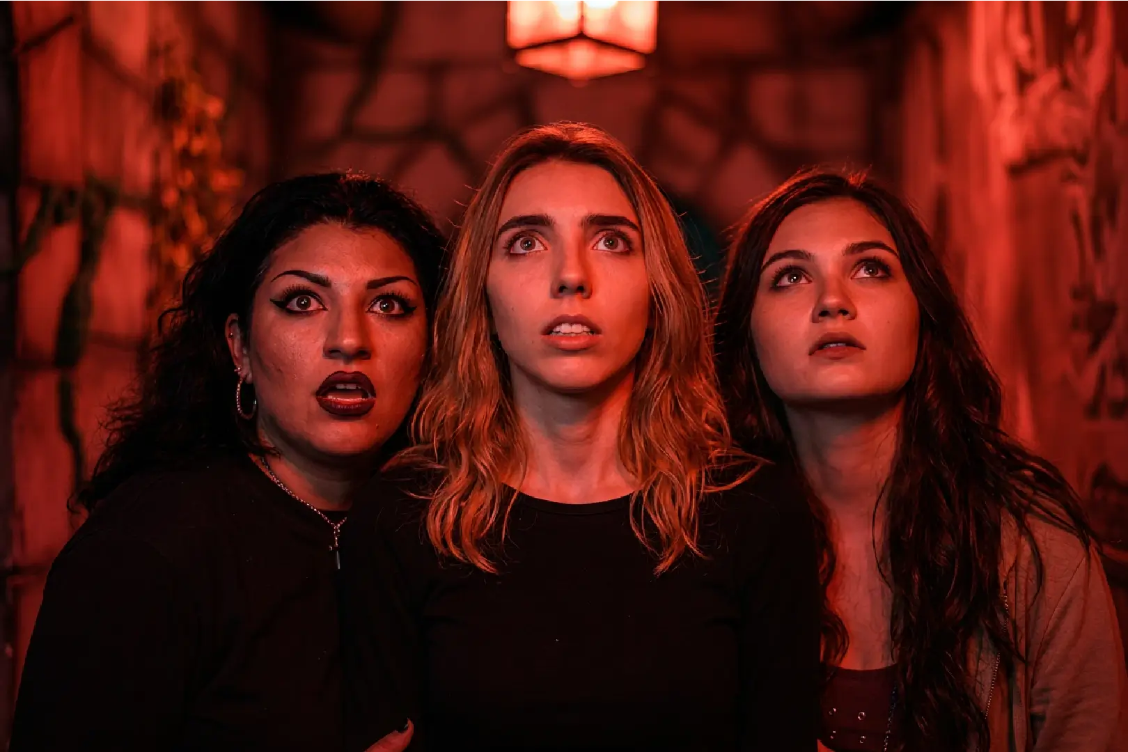 friends navigate a maze at Castle Dark