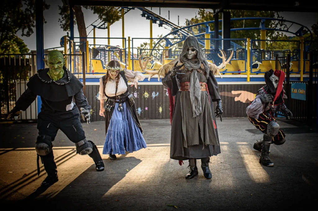 creepy characters at castle dark 2025 - premiere haunt in socal