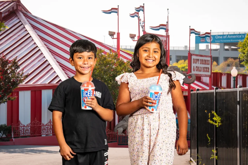kids drink slushees at big top